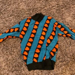 red black and blue sweater